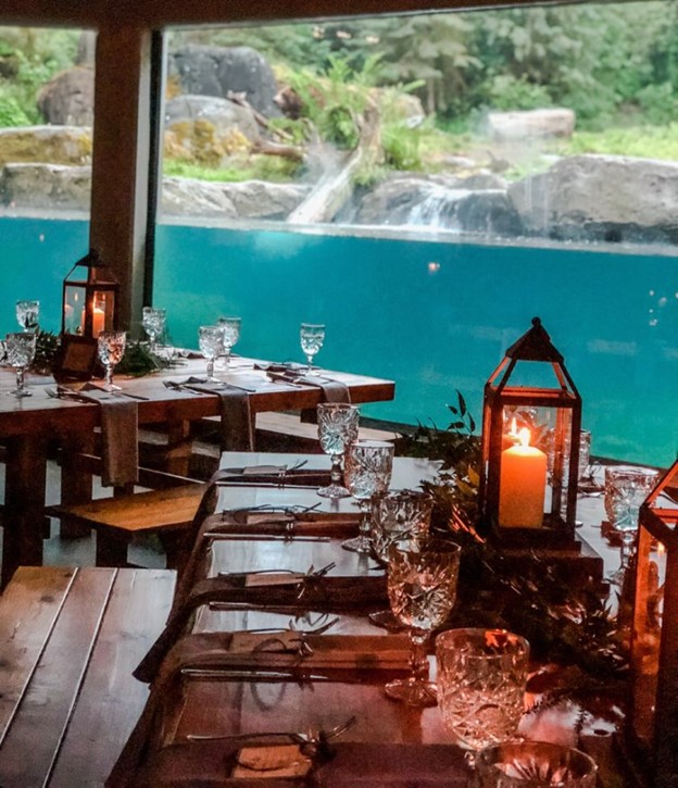 Beautiful rustic table decor with a view of the river exhibit